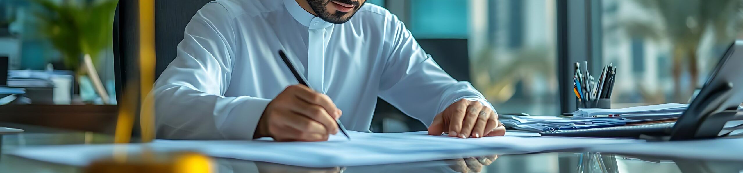 focused-arab-businessman-working-desk-office-realistic-photo
